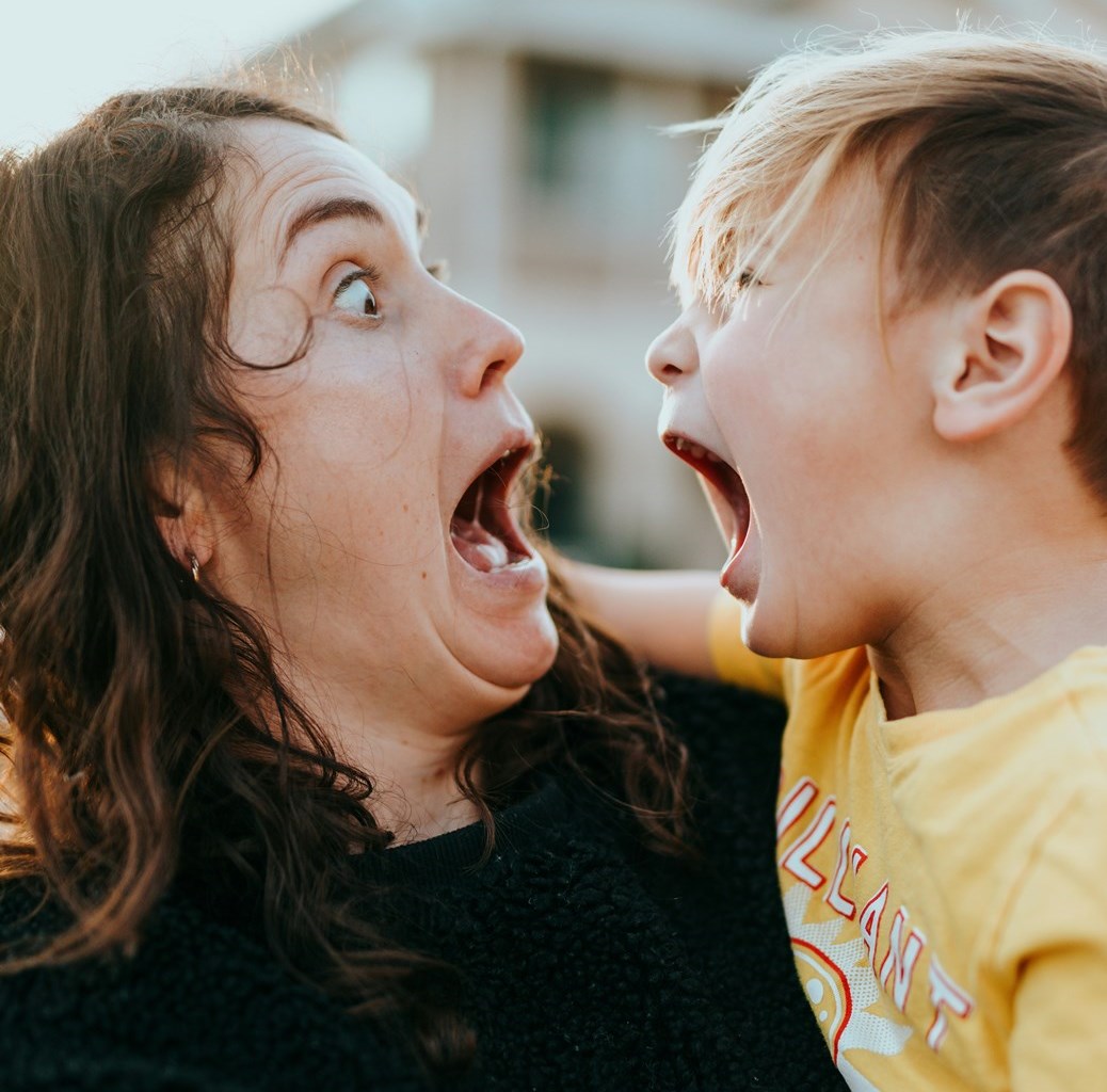 Autism Therapy – spellers center tampa A parent holding a child during a sensory meltdown — showing co-regulation in action