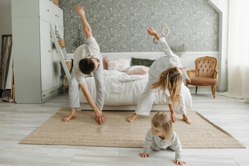 whole-body-apraxia_autism-motor-skills.jpg Occupational therapist guiding a child with autism through intentional movement